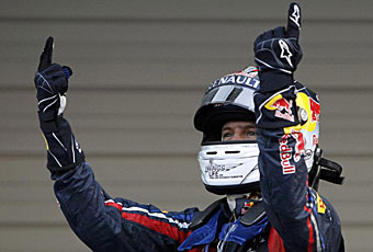 Button gana en Japón y Vettel se corona