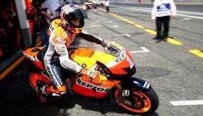 Casey Stoner (Repsol-Honda) Stoner reta a Marc Márquez