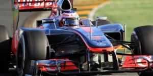 Jenson Button (McLaren Mercedes) Button y Vettel, de atrás hacia adelante