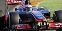 Button y Vettel, de atrás hacia adelante